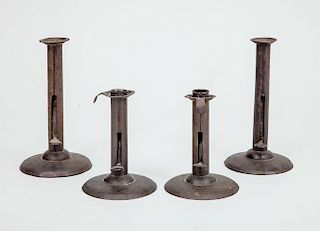 TWO ASSEMBLED PAIRS OF TIN CANDLESTICKS