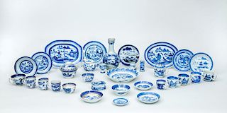 GROUP OF THIRTY CANTON BLUE AND WHITE PORCELAIN ARTICLES, IN THE WILLOW PATTERN