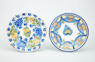 TWO POLYCHROME TIN-GLAZED EARTHENWARE CHARGERS