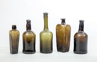 BLANKENHYM & NOLET ANGULAR GREEN GLASS BOTTLE; A SIMILAR UNMARKED BOTTLE; AND THREE OTHERS OF BOTTLE FORM