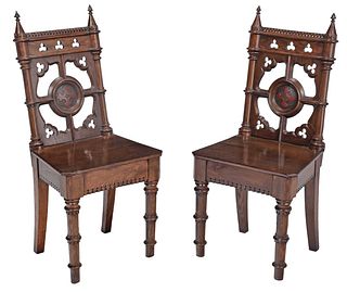 Pair Gothic Revival Carved and Painted Oak Hall Chairs