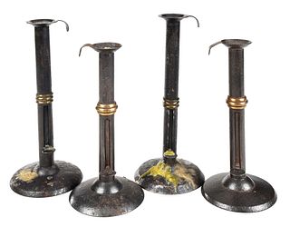 Two Pairs of Iron and Brass Wedding Band Hogscraper Candlesticks