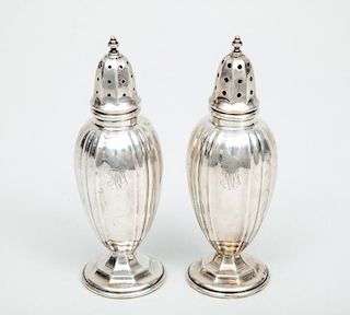 PAIR OF DOMINICK & HAFF WEIGHTED SILVER SALT AND PEPPER CASTERS
