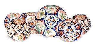 * A Group of Imari Palette Porcelain Articles Diameter of largest 18 inches.