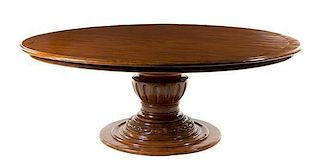 * A Regency Style Mahogany Dining Table Height 28 3/4 x diameter of top 78 inches.
