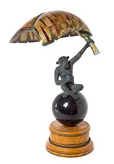 * A Patinated Brass and Penshell Veneered Figural Table Lamp Height 23 inches.