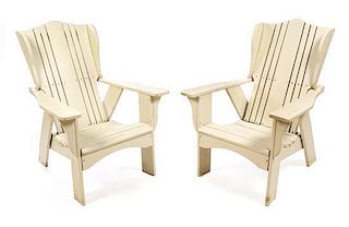 * A Set of Four Painted Adirondack Chairs Height 45 inches.