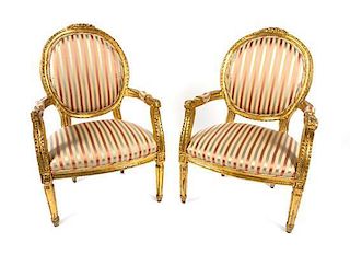 * A Pair of Louis XVI Style Giltwood Fauteuils Height 39 inches.