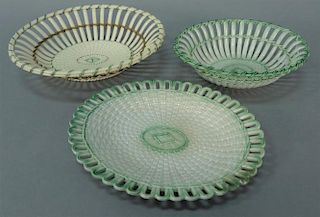 Three piece lot of soft paste including two oval baskets and one underplate, largest basket marked Wedgwood with label on bot