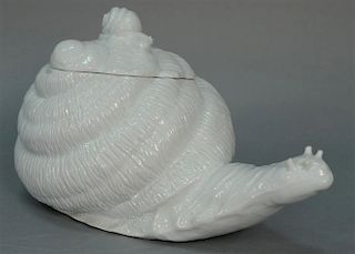Sevres porcelain snail tureen with cover, marked Cartier. 
height 8 inches, length 16 inches