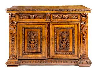 * An Italian Renaissance Style Walnut Cabinet Height 38 1/2 x width 55 1/2 x depth 22 5/8 inches.