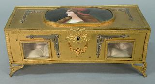 French gilt metal rectangular dresser box having oblong porcelain plaque with hand painted bust of a woman. 
height 4 1/4 inc