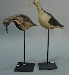 Two shore bird decoys, each on metal stand. 
(one with replaced beak, one probably a reproduction) 
heights 14 1/2 inches and