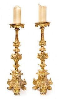 * A Pair of Italian Giltwood Prickets Height 24 7/8 inches.