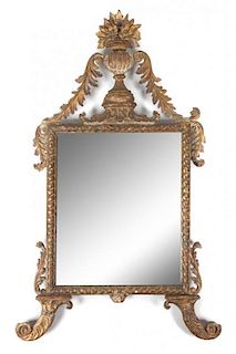 * An Italian Giltwood Mirror Height 48 x width 29 inches.