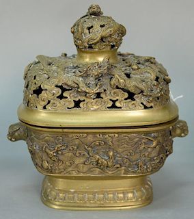 Chinese bronze dragon censer having elaborate pierced molded cover with three dragons and two phoenix birds amid clouds sitti