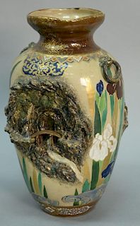 Satsuma Edo period vase having three dimensional motif on two sides depicting mountainous landscape village, and man walking 