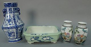 Four Chinese porcelain pieces to include a pair of Republic vases hand painted with horses, a large blue and white vase with 