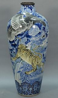 Japanese porcelain palace vase depicting tigers and birds of prey, top cut now fitted with brass sleeve, 19th century. 
(crac