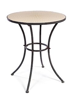 * A Mosaic-Inset Metal Garden Table Height 29 x diameter of top 24 1/2 inches.