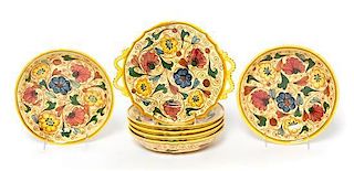 * A Group of Seven Italian Faience Plates Width of handled plate 10 1/2 inches.