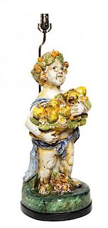 * An Italian Majolica Figure Height overall 29 1/4 inches.