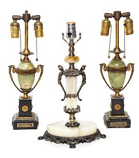 * A Pair of Gilt Metal Mounted Oynx Lamps Height of tallest 19 inches.