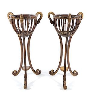 * A Pair of Regency Style Painted and Parcel Gilt Jardinieres Height 48 inches.