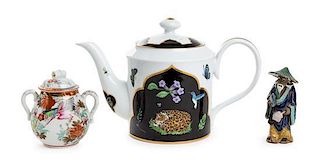 * A Group of Three Porcelain and Ceramic Articles Height of teapot 7 1/8 inches.