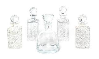* A Group of Five Glass Decanters Height of tallest 11 inches.