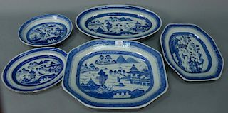 Five blue and white Canton trays including fish tray, two small oval trays, two rectangular trays (chipped and cracked), and 