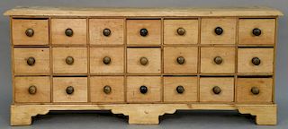 Twenty-one drawer spice cabinet having rectangular top all set on bracket base, 19th century. 
height 30 inches, cabinet widt