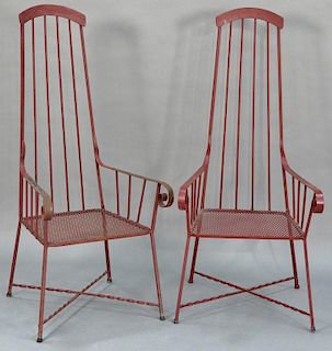 Pair of mid-century iron studio outdoor armchairs on twisted cross stretcher bases.  height 52 1/4 inches, seat height 14 1/2