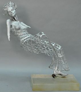 Steel sculpture of reclining woman with openwork dress set on Lexan base, attributed to Roz Newman. 
height 48 inches, length