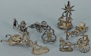 Eight piece miniature silver items to include two horse and carriages, canon, wheelbarrow with fish, mechanical windmill with