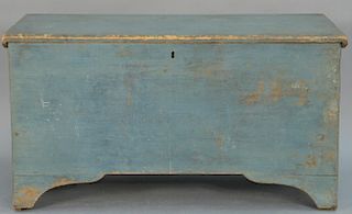 Lift top blanket chest on bracket feet in original blue paint, 18th century. 
height 23 inches, top: 18 1/2" x 42 1/2"