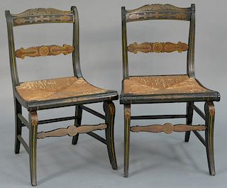 Pair of Federal slipper chairs in original paint and stenciling each with rush seat, circa 1840. 
seat height 14 1/2 inches, 