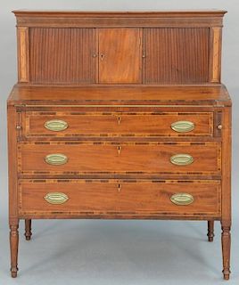 Sheraton mahogany tambour desk in two parts set on turned legs, circa 1830. 
height 47 1/2 inches, width 39 inches, depth 20 