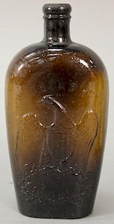 Amber flask with eagle under "Liberty" marked Willington Glass West Willington, Conn. 
height 9 1/4 inches