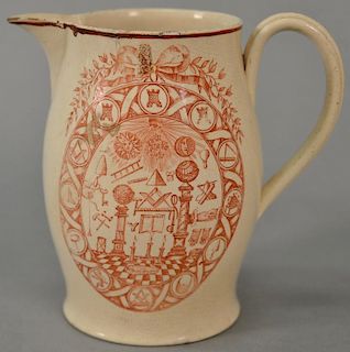 Masonic Liverpool pitcher, painted in red Free Mason symbols on one side and a poem on the opposing side, 19th century. 
(min