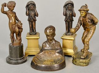 Group of five small bronzes to include a man playing Bocce Ball, a small tray marked P. Tereszczuk, a pair of small bronze bo