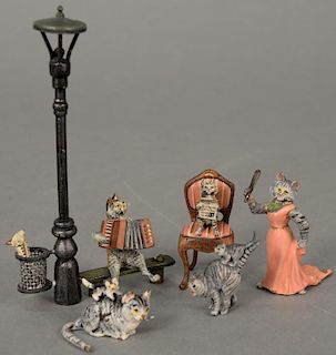 Five miniature Austrian cold painted bronze figural cats to include a cat on a chair, two cats with a kitten on it's back, a 