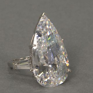 18K white gold ring set with large pear shaped cubic zirconia.