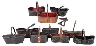 A Lifetime Collection of Ten Virginia Tooled Leather Key Baskets