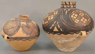 Two painted red pottery jars, Majiayao culture, Machang type, painted in red and black with anthropomorphic figural designs a