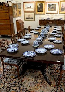 Three part mahogany dining table, each section separates as a square or round with four drop leaves, each table set on square