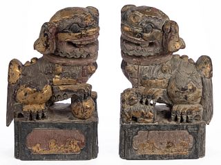 CHINESE CARVED AND PARCEL-GILT PAIR OF FOO DOGS / TEMPLE LIONS