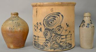 Three stoneware pieces including a large six gallon blue decorated crock (as is), a small bottom marked Post in blue, and a j