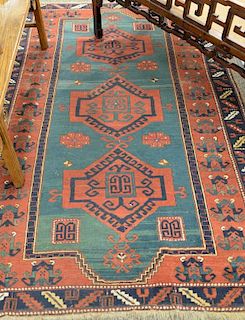 Caucasian Oriental area rug. 
5'4" x 8'6"
