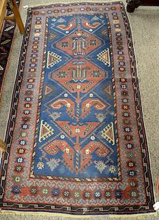 Caucasian Oriental throw rug. 
3'7" x 6'11"
